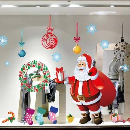 Decoração de Natal para loja de roupas com adesivos na vitrine24