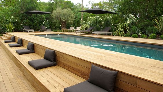 piscina acima do solo com deck em madeira