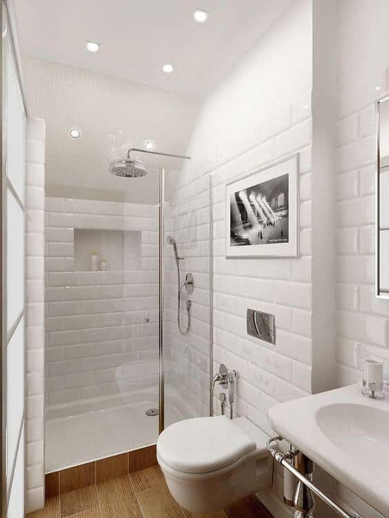banheiro pequeno com azulejo metro branco com rejunte branco