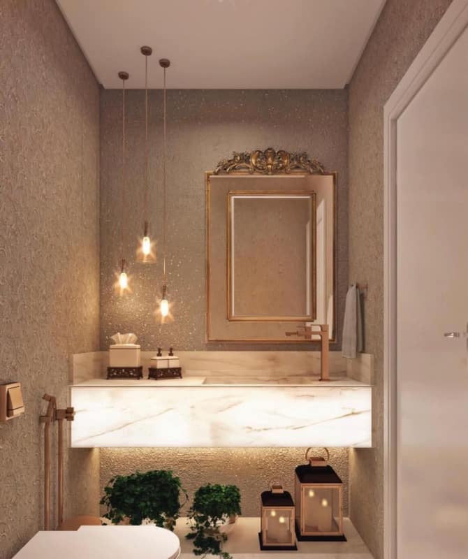 lavabo moderno com lanternas decorativas com dourado