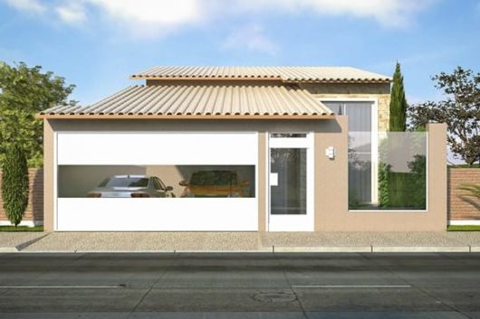 casa com portão de vidro