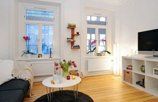 Apartamento pequeno decorado: Decoração simples clean