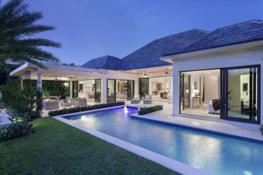 Casas com piscina: casa de luxo com piscina em l
