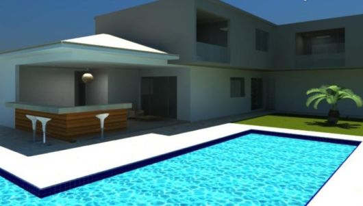 Casas com piscina: casa em l com churrasqueira