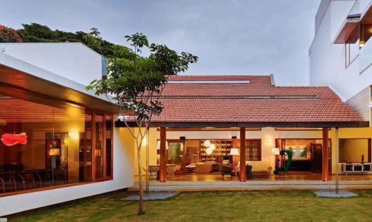 Casas em L: Com varanda