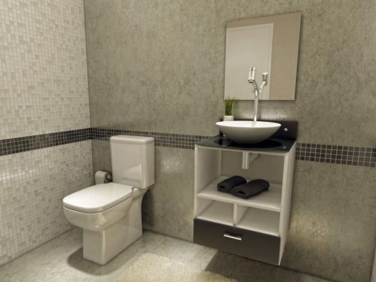 Banheiros decorados: Com faixa preta