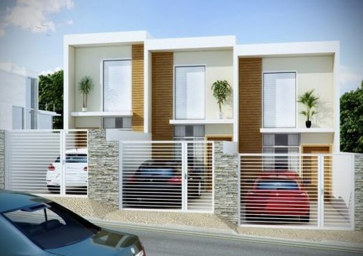 Fachadas de casas populares: Sobrado branco e marrom