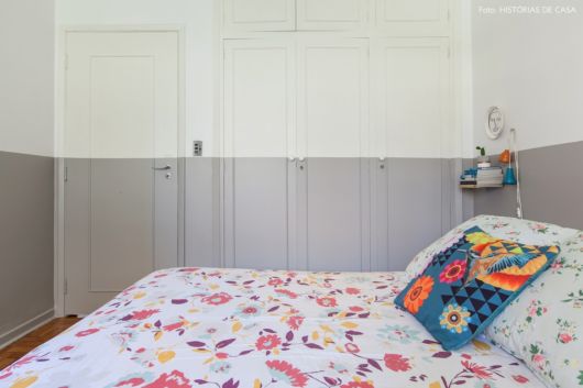 quarto com meia parede pintada