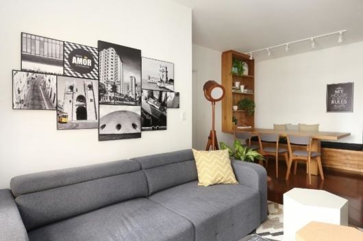 parede de sala com quadros