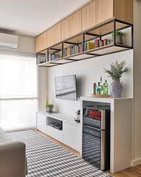 Sala de estar e de TV com nichos