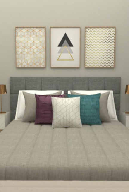 Quarto de casal cinza com quadros