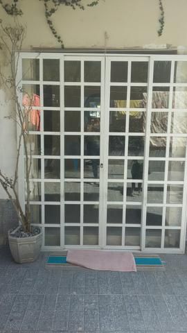 Porta de alumínio de correr