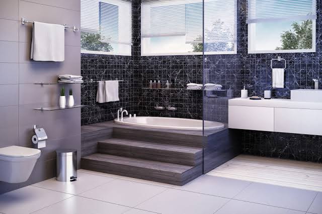banheiro preto e branco com banheira grande