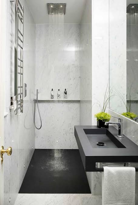 decoração de banheiro preto e branco pequeno