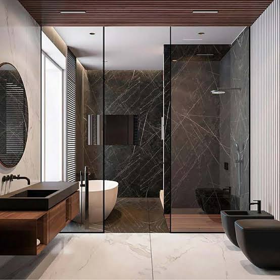 pequeno banheiro preto e branco com banheira